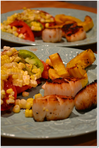 Seared scallops and fresh tomatoes and corn. Seared scallops and fresh tomotoes and corn