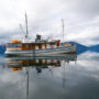 small ship cruising boat in Alaska