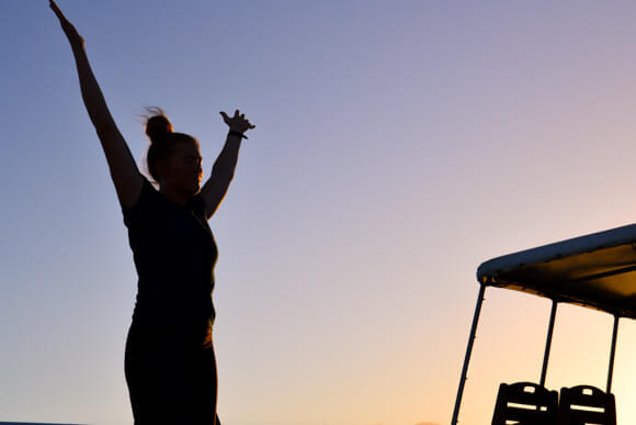 Sunrise yoga Uncruise Adventure in Hawaii