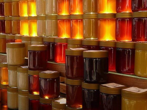 jars of honey with light