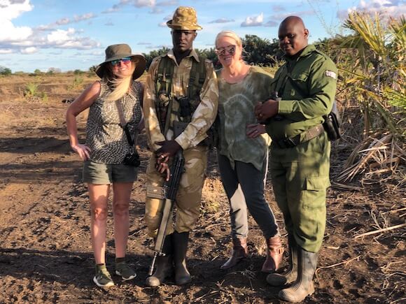 Kenya rangers and two women