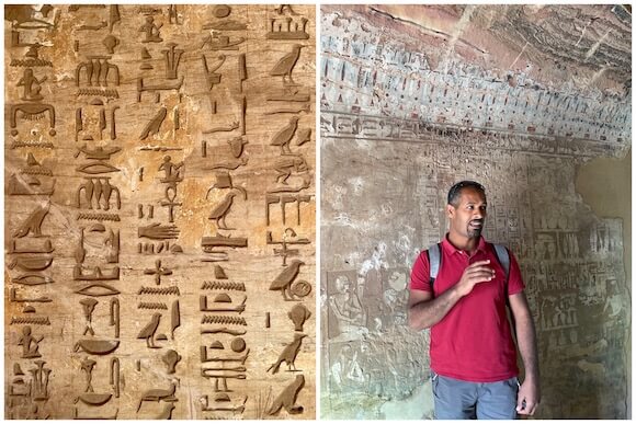 guide in Egyptian tomb and hieroglyphics