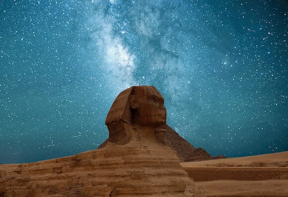 Night sky with stars above Sphinx in Egypt.