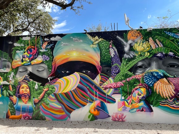Colorful street art of women and nature