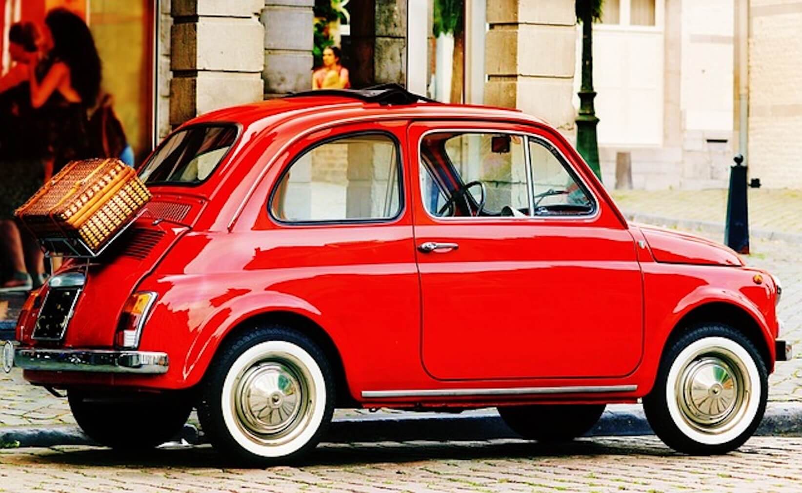 Red car on street in Italy